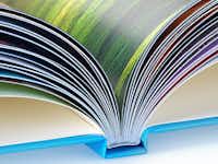 Premium papier zijdeglans Vrijstaande foto van een open fotoboek met zijdeglans premium papier